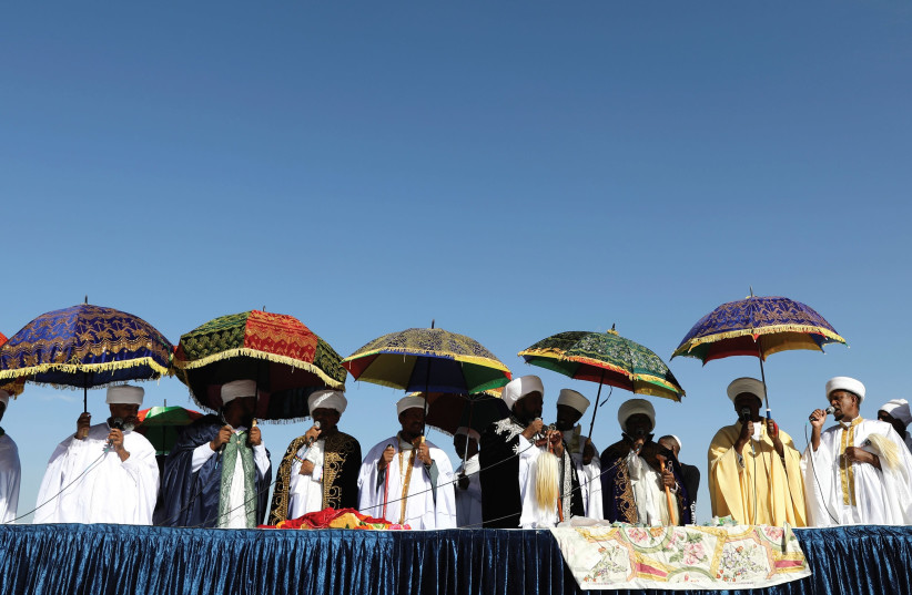 RELIGIOUS LEADERS of the Israeli Ethiopian community take part in a ceremony marking the Ethiopian holiday of Sigd in Jerusalem in November. (photo credit: REUTERS)
