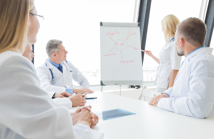 A team of doctors discuss mental health (Illustrative)