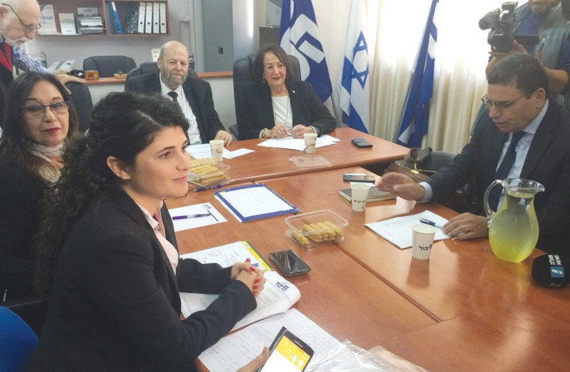 Likud MK Sharren Haskel (left foreground) is taken to task for her opposition to the ‘minimarket bill’ by an internal faction court in Jerusalem yesterday (photo credit: Courtesy)