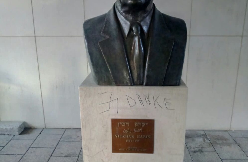 The defaced statue of former prime minister Yitzhak Rabin in Tel Aviv. (Courtesy of Police Spokesman’s Unit) (photo credit: POLICE SPOKESPERSON'S UNIT)