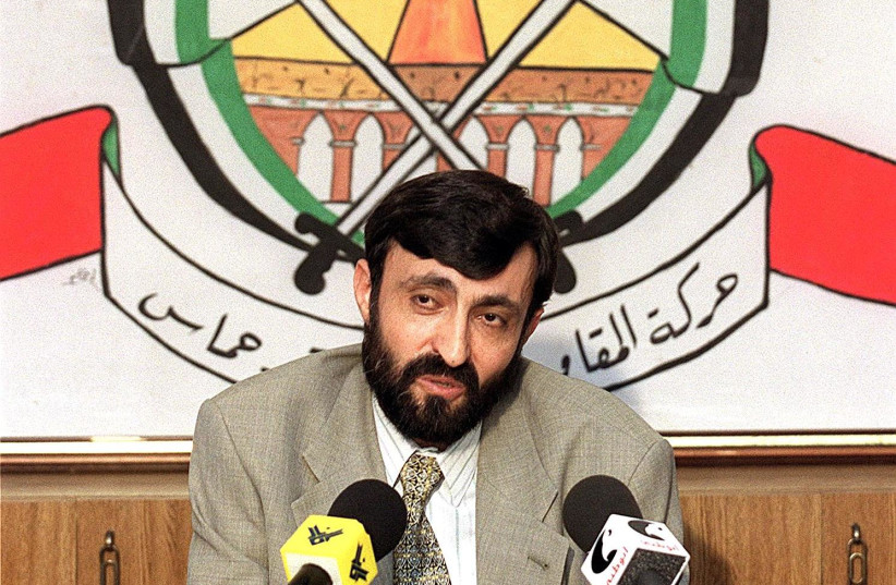 Imad al-Alami, talks to journalists at a press conference held in the southern suburbs of Beirut in 1999. (photo credit: JOSEPH BARRAK / AFP)