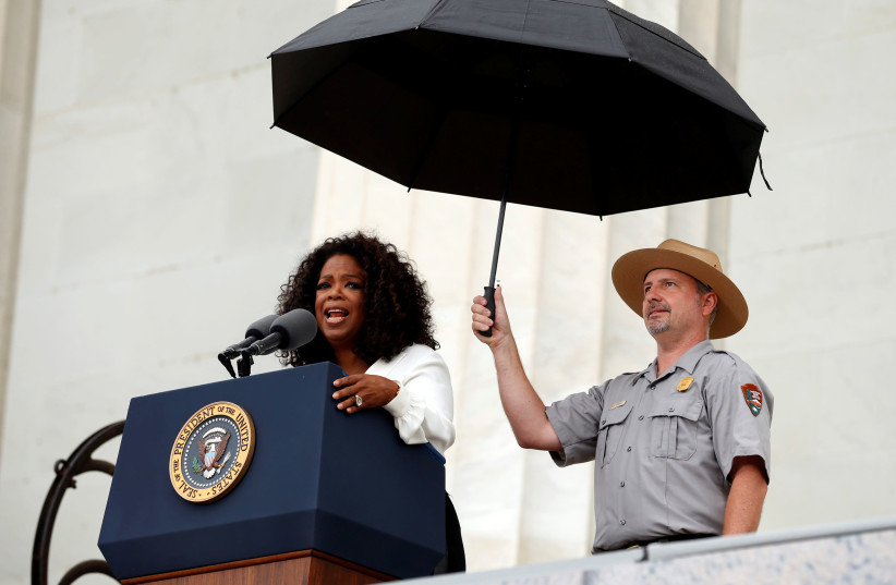 Oprah Winfrey speaks during the commemoration of the 50th anniversary of the March on Washington and Reverend Martin Luther King Jr.'s 'I have a dream' speech at the Lincoln Memorial in Washington, DC. (photo credit: REUTERS)