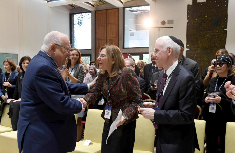President Reuven Rivlin shakes hands with AIPAC President Lillian Pinkus on January 14th, 2018. (photo credit: Mark Neiman/GPO)