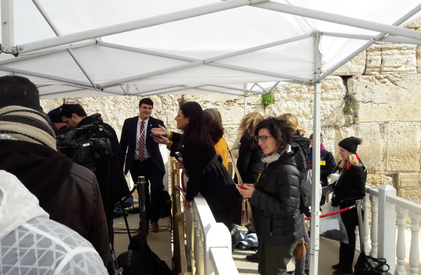 The Israeli press gathering at the Kotel moments before US Vice President Pence arrives. (photo credit: HERB KEINON)