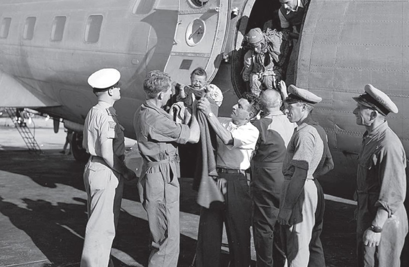  JEWISH AGENCY representatives meet Yemenite immigrants arriving at Lod Airport in 1949. (Wikimedia Commons) (credit: Wikimedia Commons)