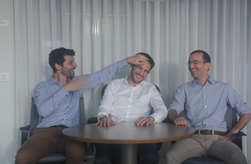 Michael Braginsky (left), Elad Walach (middle), and Guy Reiner (right) have launched a startup that refines and quickens how radiologists check your X-rays, transforming the diagnosis you get. (photo credit: Courtesy)