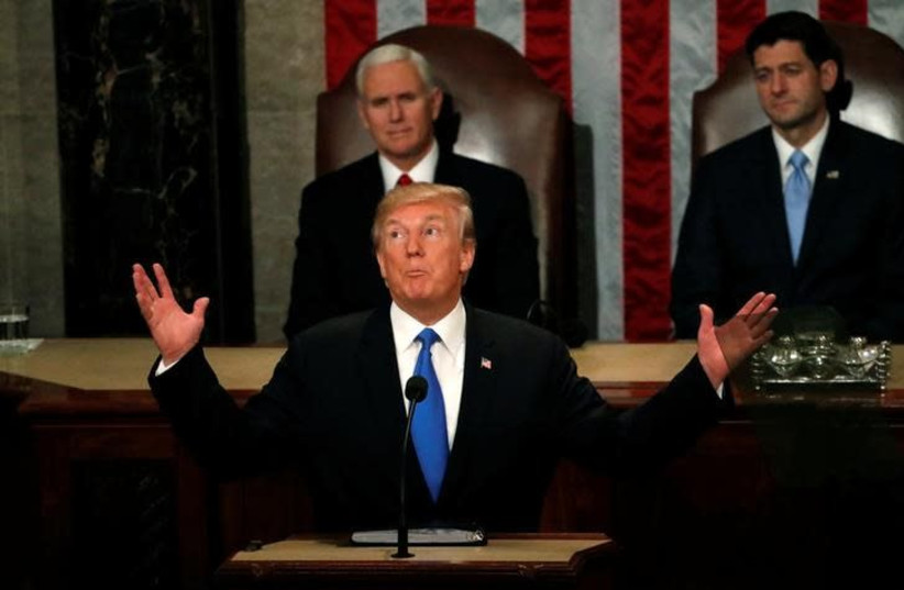US President Donald Trump gestures as he delivers his State of the Union address to a joint session of the US Congress on Capitol Hill in Washington, US January 30, 2018 (photo credit: REUTERS/LEAH MILLIS)