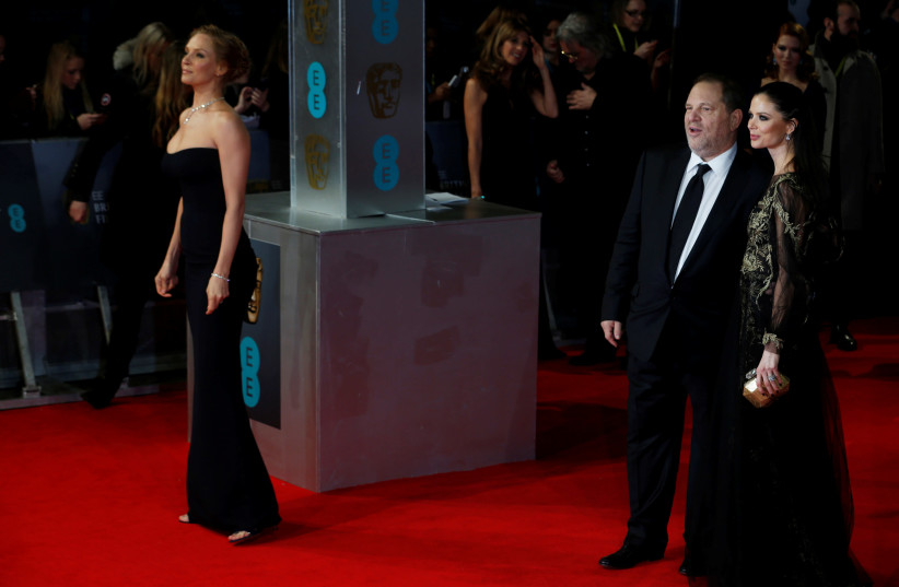 Uma Thurman (L), Harvey Weinstein and Georgina Chapman arrive at the British Academy of Film and Arts (BAFTA) awards ceremony at the Royal Opera House in London, February 16, 2014. (photo credit: REUTERS/LUKE MACGREGOR)