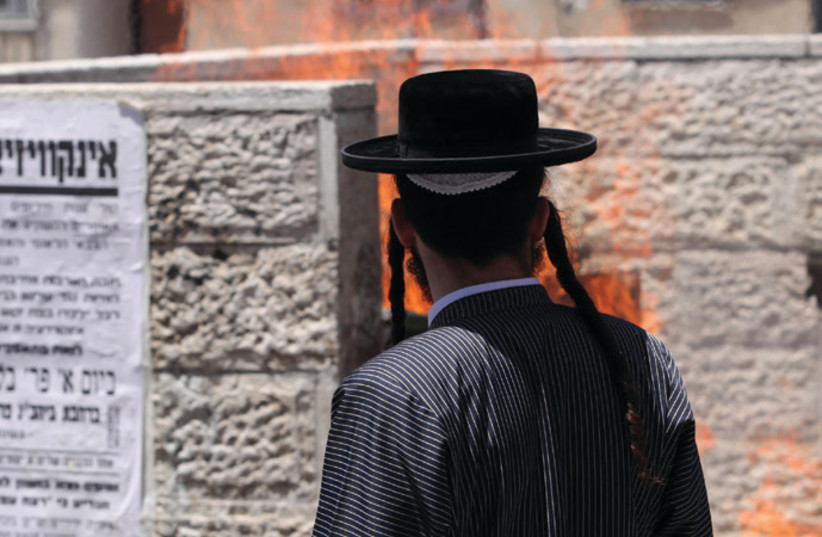 A young Haredi man outside the IDF enlistment office in Jerusalem (photo credit: MARC ISRAEL SELLEM)