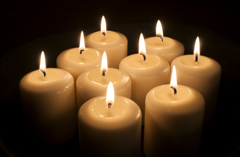 Memorial candles. (credit: INGIMAGE)