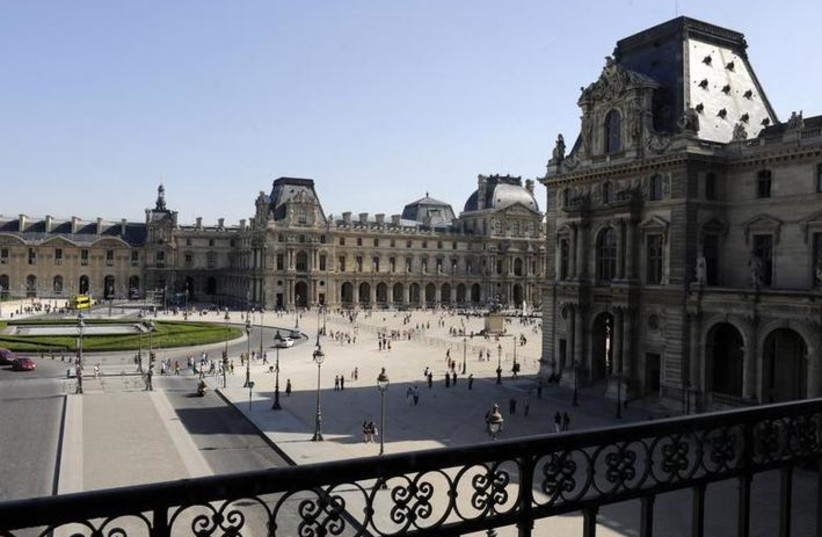General view of the exterior of the Louvre Museum in Paris August 12, 2009. REUTERS/Jacky Naegelen (photo credit: REUTERS/JACKY NAEGELEN)