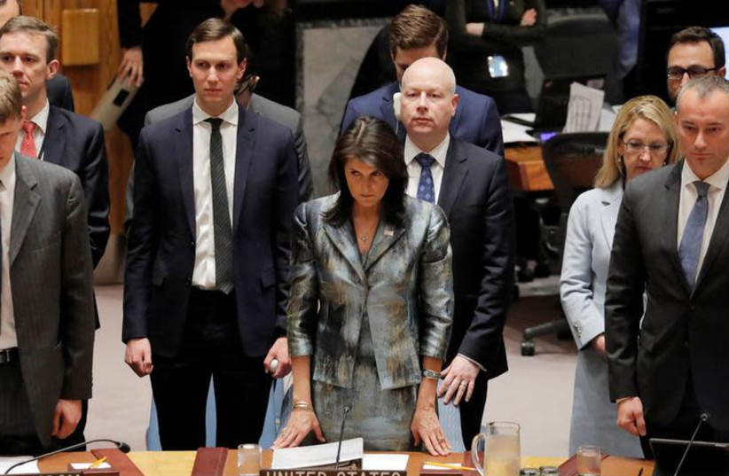 U.S. United Nations ambassador Nikki Haley (C) White House senior adviser Jared Kushner (L) and Jason Greenblatt (R), U.S. President Donald Trump's Middle East envoy, stand before the start of a Security Council meeting on the situation in the Middle East at the United Nations in New York, U.S., Feb (photo credit: LUCAS JACKSON/REUTERS)