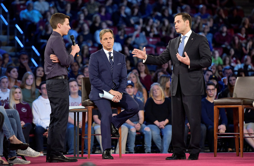 Marjory Stoneman Douglas student Cameron Kasky asks Senator Marco Rubio if he will continue to accept money from the NRA (photo credit: REUTERS/MICHAEL LAUGHLIN/POOL)