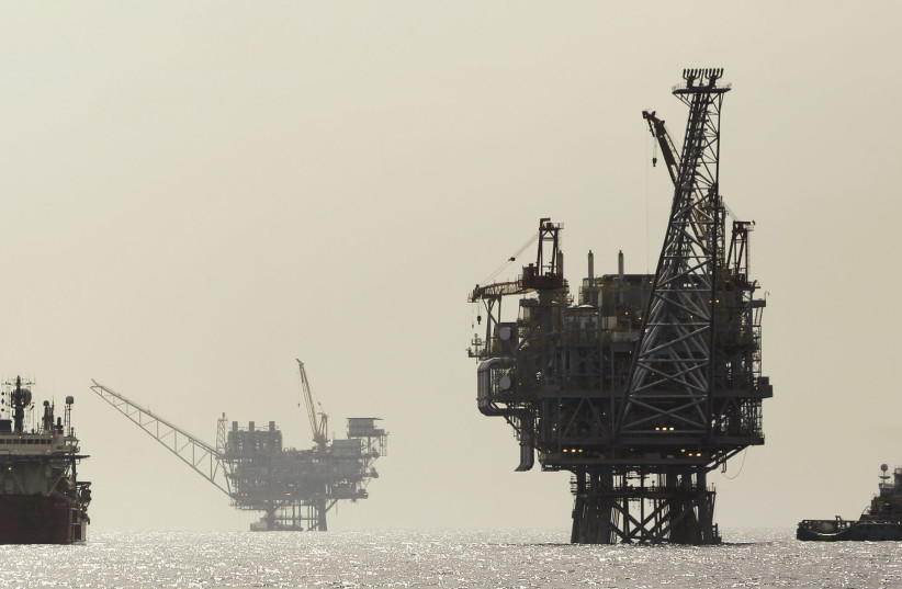 An Israeli gas platform is seen in the Mediterranean, 24 km. west of Ashdod (photo credit: AMIR COHEN/REUTERS)