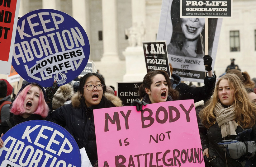 Women protesting for abortion rights, forty-five years after Roe v. Wade. (credit: REUTERS)