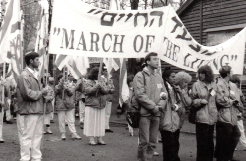 MARCHERS TAKE part in the  rst March of the Living at Auschwitz-Birkenau in 1988 (photo credit: COURTESY MOSHE MILNER/MOL)