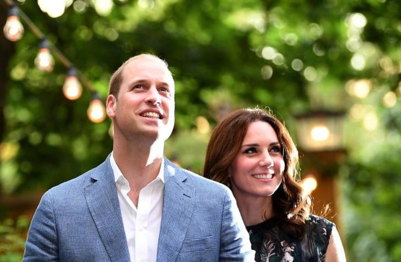  Britain's Prince William, the Duke of Cambridge and his wife Princess Kate, the Duchess of Cambridge, attend a reception at Claerchens Ballhaus, in Berlin Germany, July 20, 2017 (photo credit: REUTERS/BRITTA PEDERSEN)