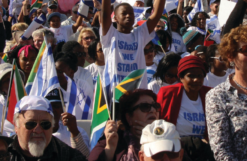 South African Jews and supporters gather in support of Israel at a demonstration in Johannesburg (credit: ILAN OSSENDRYVER)