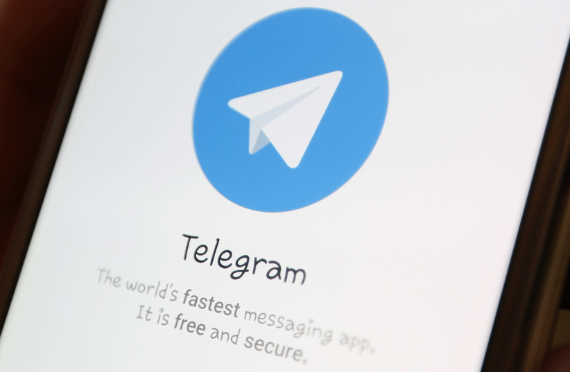 The Telegram logo is seen on a screen of a smartphone in this picture illustration (credit: ILYA NAYMUCHIN)