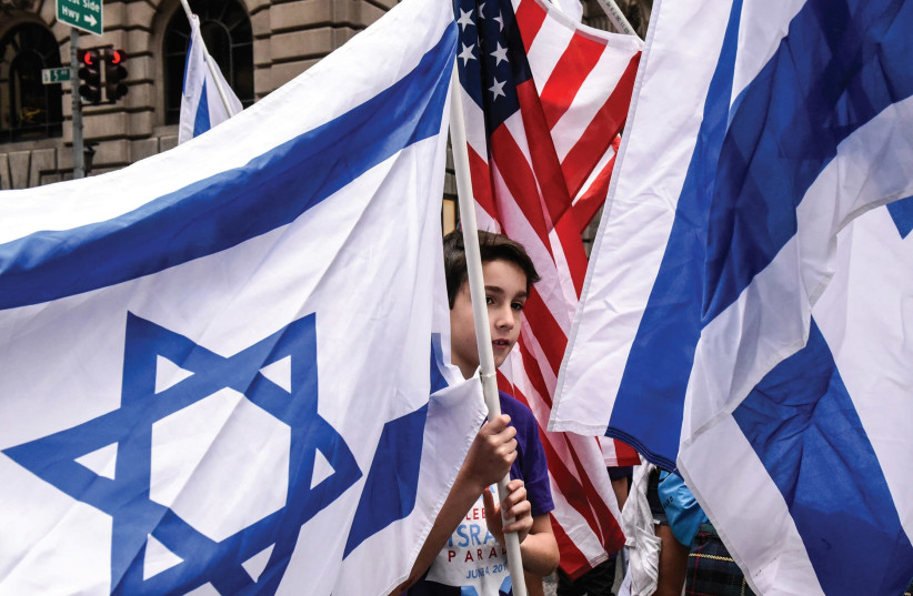 ISRAELI AND American flags at an event in New York City.  (photo credit: REUTERS)