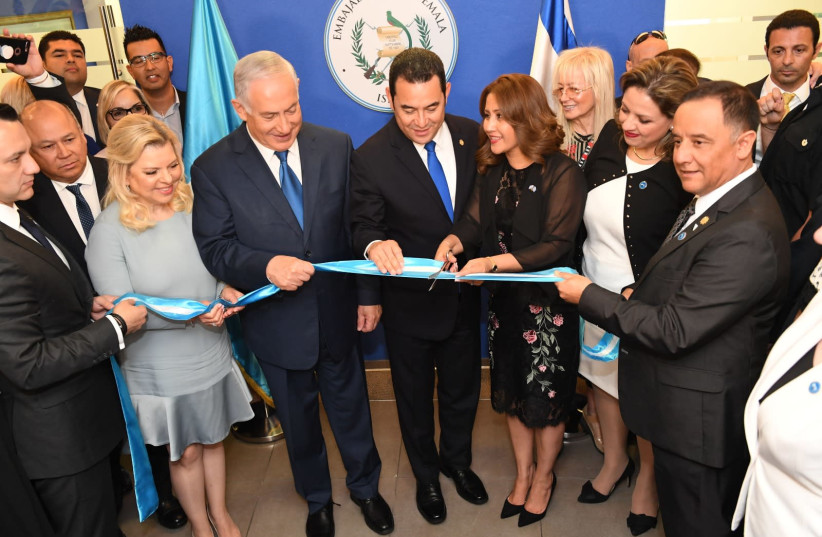 Prime Minister Benjamin Netanyahu with Guatemalan President Jimmy Morales at the opening of the Guatamalan embassy in Jerusalem (credit: KOBI GIDEON/GPO)