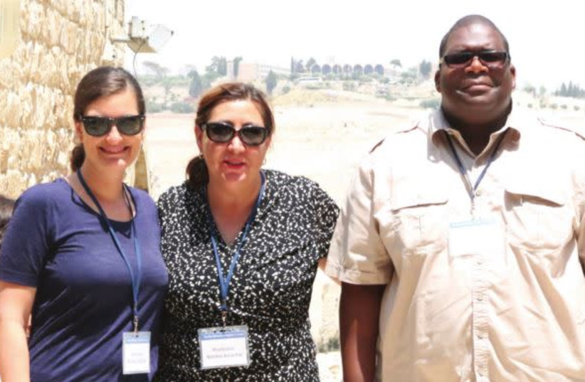 From left to right: Profs. Amalia Leicester, Norma Alcantar and Tyrell Carr pose in Jerusalem’s Old City as part of their Faculty Fellowship trip in Israel (photo credit: ERIC NARROW)