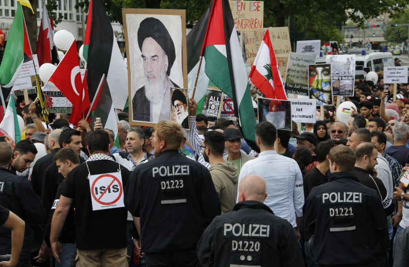 Demonstrators attend an 'al-Quds Day' protest rally in Berlin, Germany, July 11, 2015 (credit: FABRIZIO BENSCH / REUTERS)