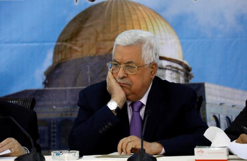 Palestinian Authority President Mahmoud Abbas attends the meeting of the Palestinian Central Council, in Ramallah, in the West Bank August 15, 2018 (photo credit: REUTERS/MOHAMAD TOROKMAN)