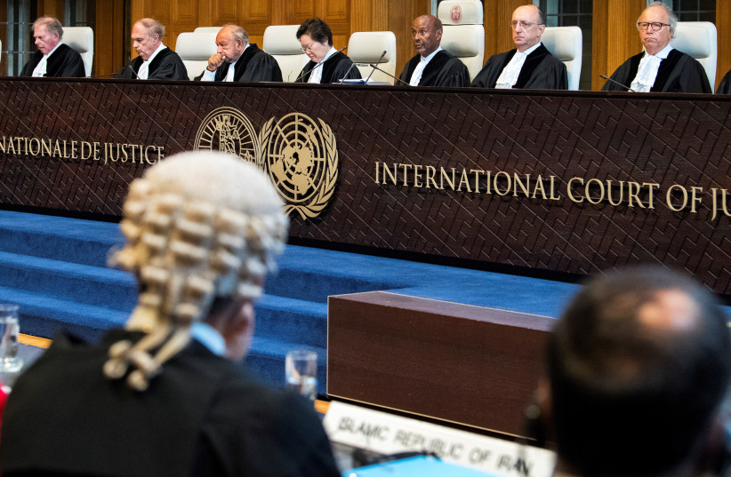 Members of the International Court of Justice attend a hearing for alleged violations of the 1955 Treaty of Amity between Iran and the U.S., at the International Court in The Hague, Netherlands August 27, 2018. (credit: REUTERS/PIROSCHKA VAN DE WOUW)