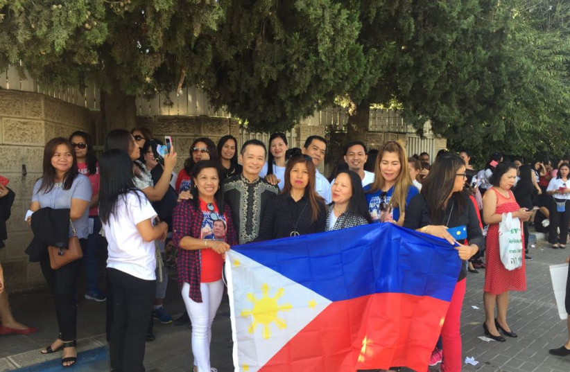 Care workers from the Philippines welcome President Duterte to Israel (credit: Courtesy)