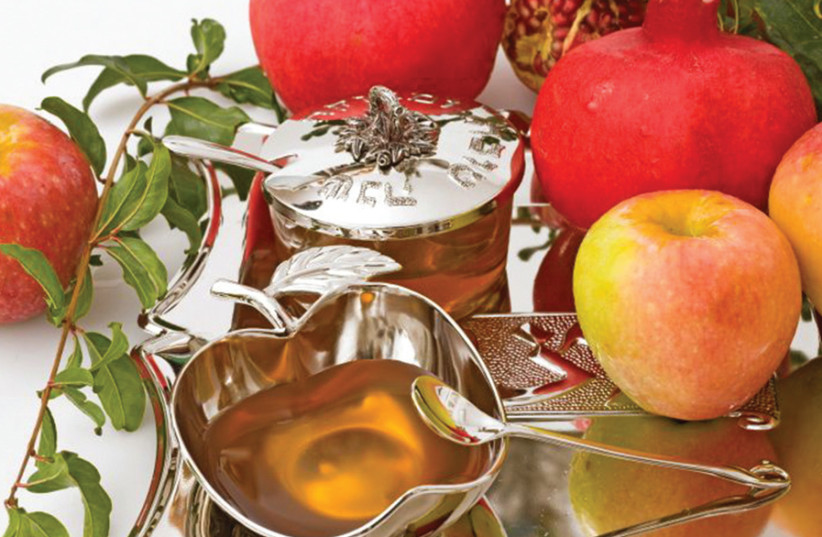 APPLES AND honey: The classic Rosh Hashanah combination. (credit: SUFECO/FLICKR)