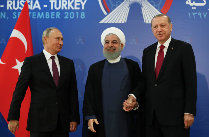 President Vladimir Putin of Russia, Hassan Rouhani of Iran and Tayyip Erdogan of Turkey meet in Tehran, Iran September 7, 2018. (credit: REUTERS)
