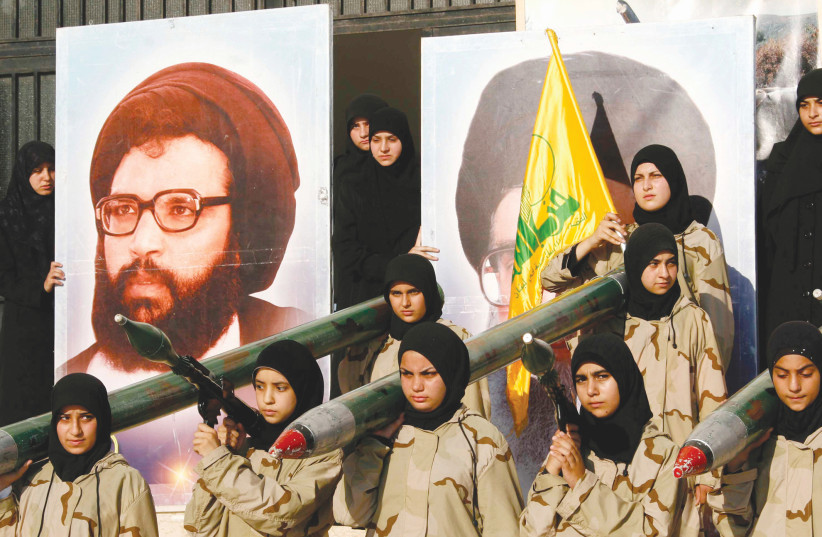 Iran's sponsorship of Hezbollah includes $800 million in annual financial support, the supply of 130,000 rockets and missiles (photo credit: REUTERS)
