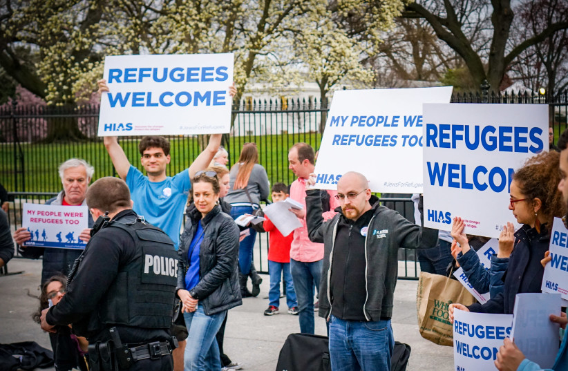 HIAS SUPPORTERS take part in a pro-immigration rally in Washington last year. (credit: TED EYTAN)