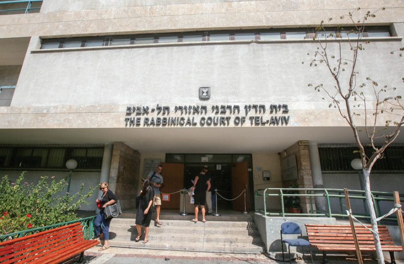 THE RABBINICAL court of Tel Aviv. It has been said that rabbinical courts allow men to hold back consent to divorce their wives in order to extort the women into agreeing to unfair overall terms. (credit: MARC ISRAEL SELLEM)