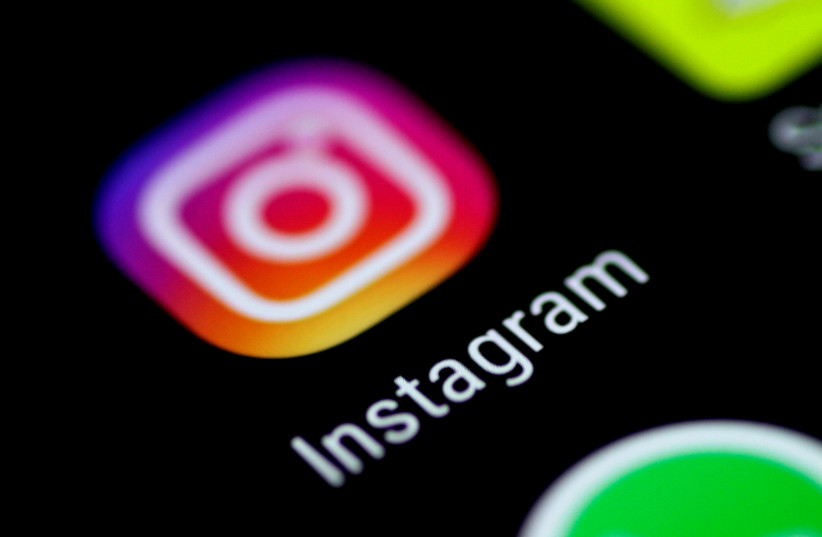The Instagram application is seen on a phone screen August 3, 2017.  (credit: REUTERS/THOMAS WHITE)