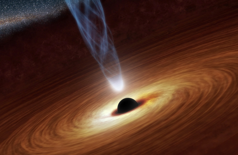 A supermassive black hole with millions to billions times the mass of our sun is seen in an undated NASA artist's concept illustration. (credit: REUTERS/NASA/JPL-CALTECH/HANDOUT)