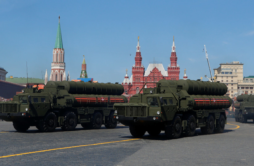 Russian servicemen drive S-400 missile air defense systems during the Victory Day parade, marking the 73rd anniversary of the victory over Nazi Germany in World War Two, at Red Square in Moscow, Russia May 9, 2018 (photo credit: REUTERS/SERGEI KARPUKHIN)