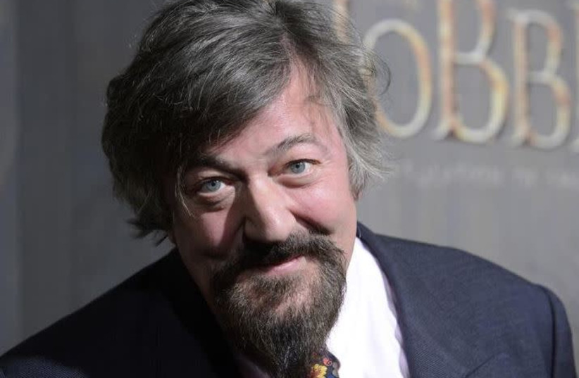 Cast member Stephen Fry attends the premiere of the film ''The Hobbit: The Desolation of Smaug'' in Los Angeles December 2, 2013. (credit: PHIL MCCARTEN/REUTERS)