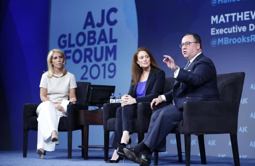Matthew Brooks (R) and Halie Soifer (C) speaking at AJC's global forum plenary session, June 2019 (credit: MARTIN SIMON)