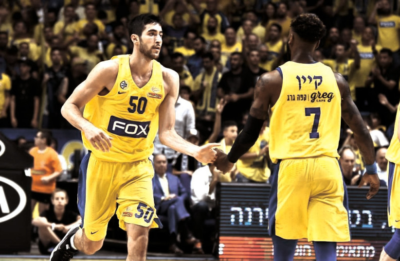 Yovel Zoosman and DeAndre Kane of Maccabi Tel Aviv in a game against Maccabi Rishon Lezion, June 13, 2019 (credit: DOV HALICKMAN PHOTOGRAPHY/COURTESY)