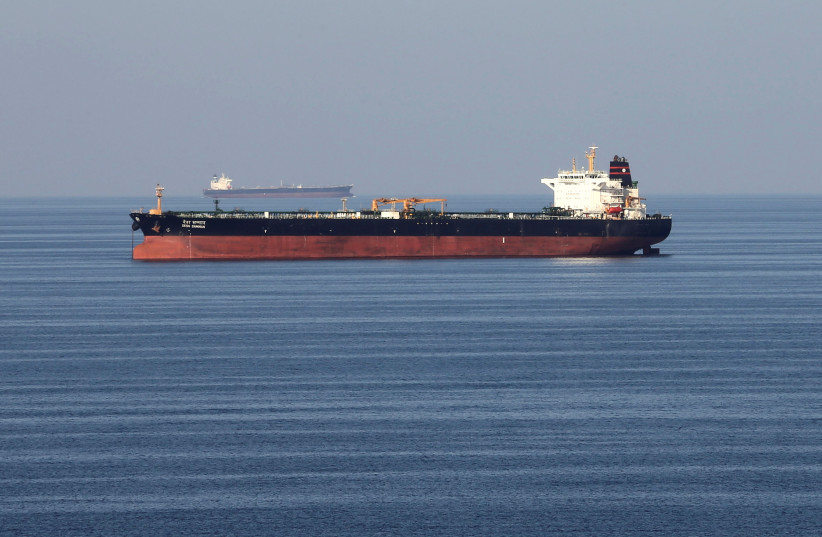 Oil tankers pass through the Strait of Hormuz (credit: REUTERS/HAMAD I MOHAMMED)