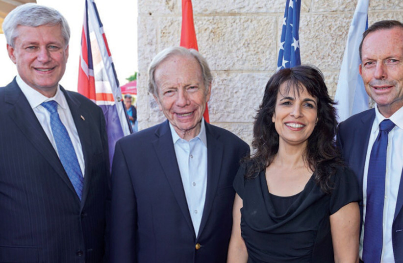 Nitsana Darshan-Leitner at the Shurat HaDin Law and War Conference, with (from left) former Canadian prime minister Stephen Harper, US Senator Joe Lieberman and former Australian prime minister Tony Abbott