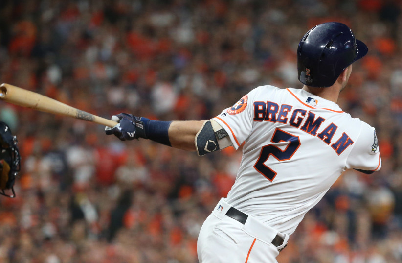 Oct 29, 2019; Houston, TX, USA; Houston Astros third baseman Alex Bregman (2) hits a solo home run against the Washington Nationals in the first inning in game six of the 2019 World Series at Minute Maid Park (credit: TROY TAORMINA-USA TODAY SPORTS)