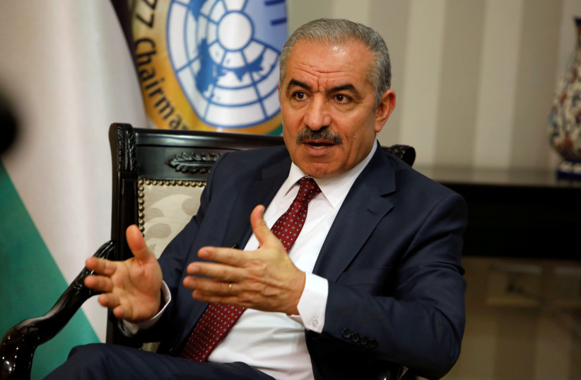 Palestinian Prime Minister Mohammad Shtayyeh gestures during an interview with Reuters in his office in Ramallah, in the Israeli-occupied West Bank, June 27, 2019
