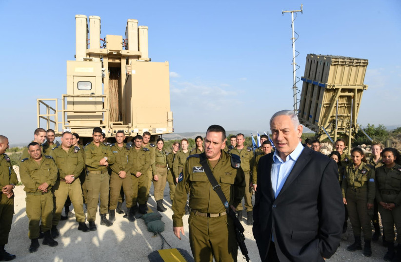 Prime Minister Benjamin Netanyahu [R] visits Iron Dome command (photo credit: AMOS BEN-GERSHOM/GPO)