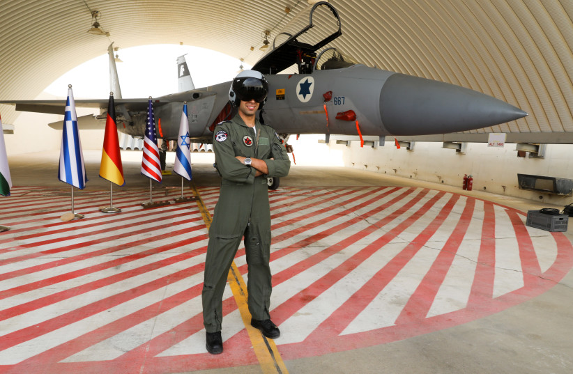 Capt. B stands in front of an F-15 IAF plane during the Blue Flag drill (photo credit: MARC ISRAEL SELLEM/THE JERUSALEM POST)