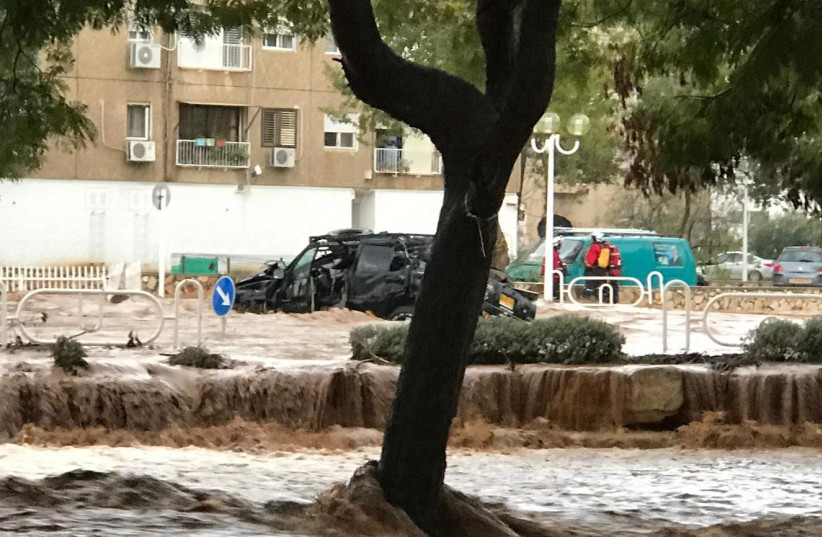 Nahariya man drowns in flood while attempting to save others (credit: NOAM FLAKSA/TPS)