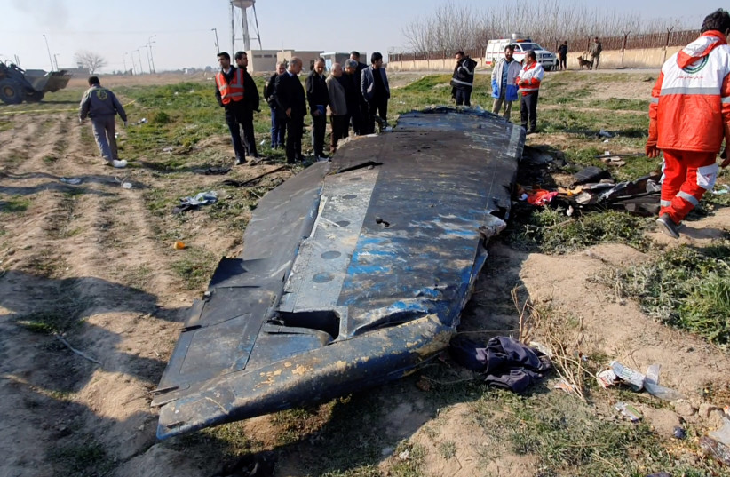 General view of the debris of the Ukraine International Airlines, flight PS752, Boeing 737-800 plane that crashed after take-off from Iran's Imam Khomeini airport, on the outskirts of Tehran, Iran January 8, 2020 (photo credit: SCREENSHOT/REUTERS)