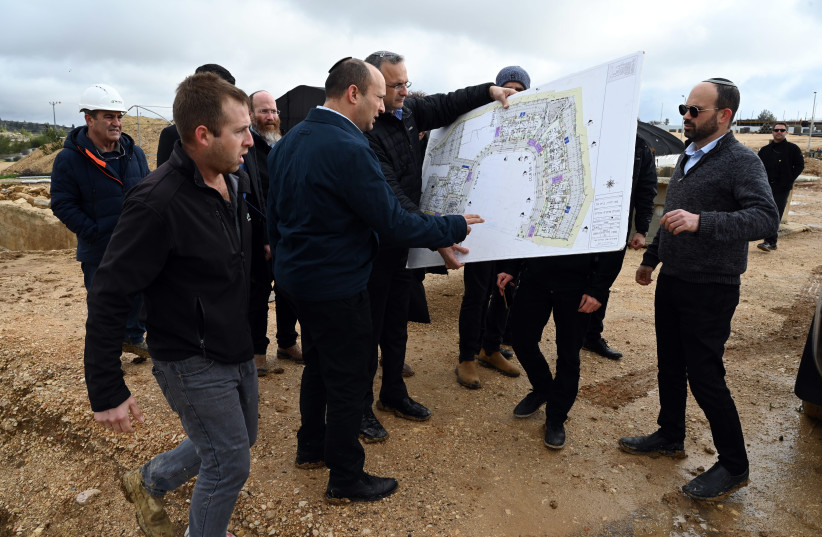 Then Minister of Defense Naftali Bennett visits new housing projects in Judea and Samaria (photo credit: ARIEL HERMONI/DEFENSE MINISTRY)